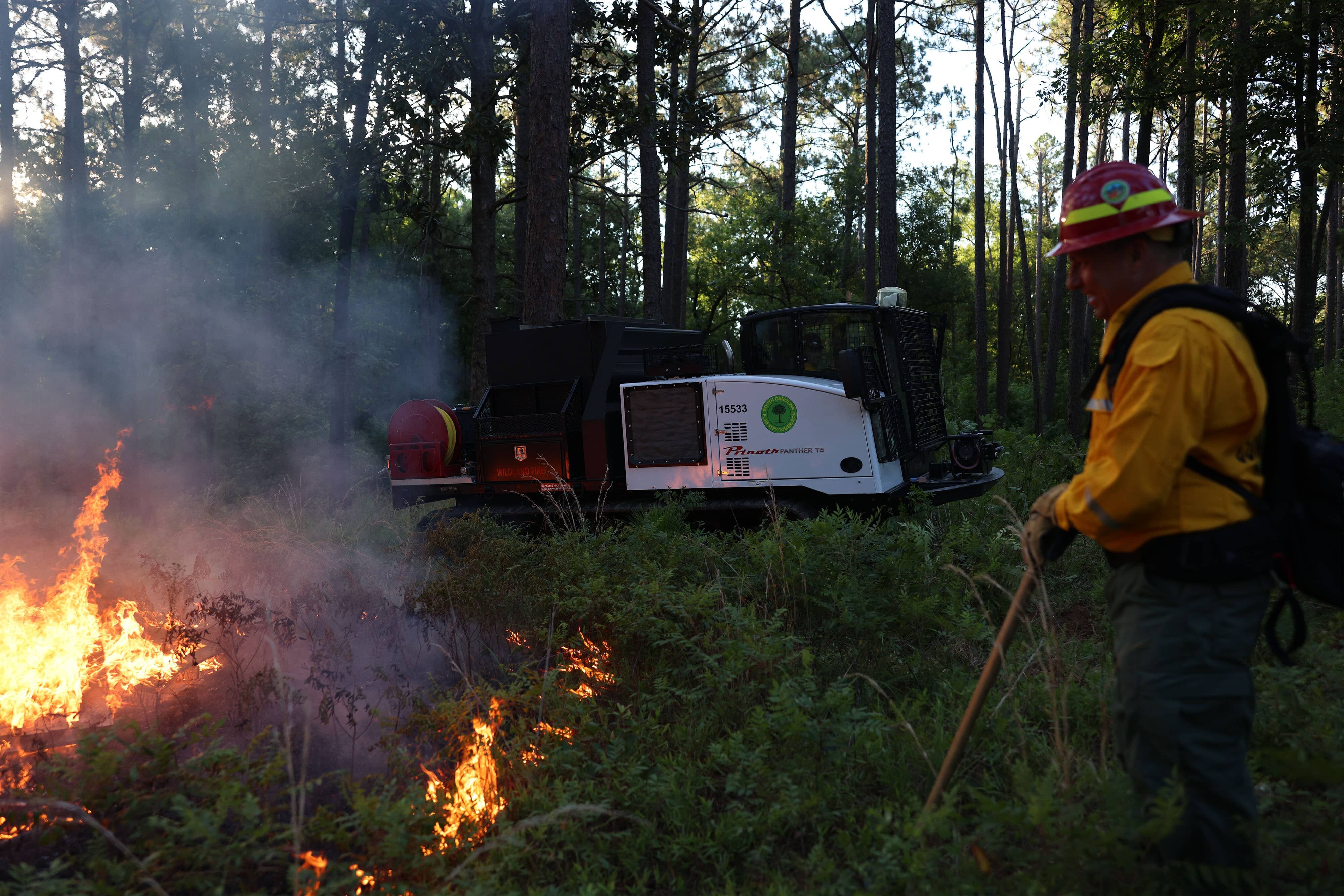 Prinoth Panther T6 tracked vehicle on rugged terrain, demonstrating its ability to access hard-to-reach areas for firefighting and rescue missions.