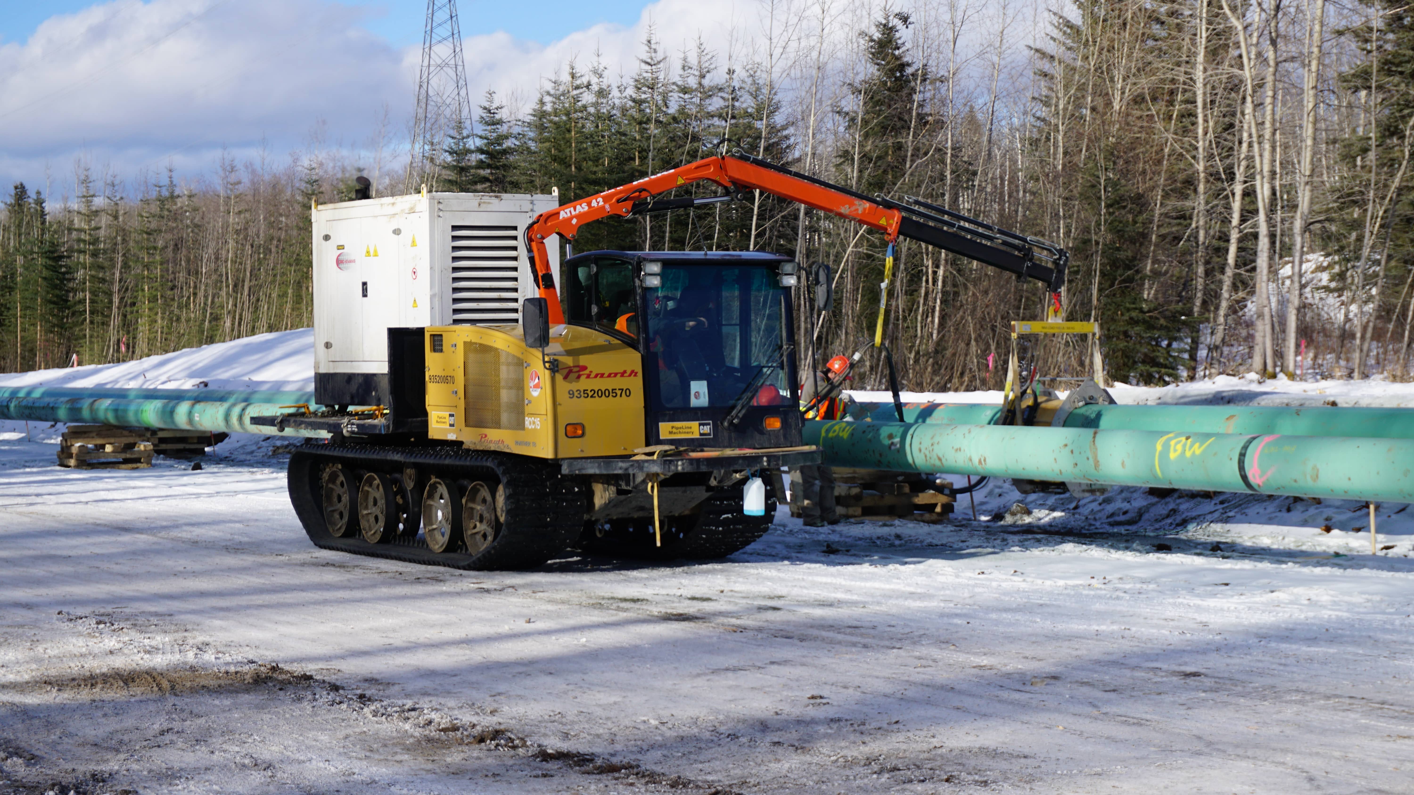 Prinoth Panther crawler carrier for oil and gas applications on a snowy construction site.