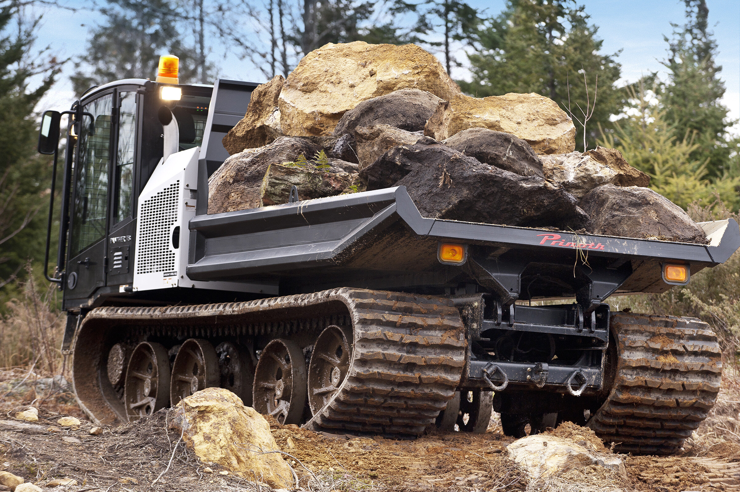 When equipped with a dumper body, the Panther T16 can carry up to 7,257 kg (16,000 lb) while maintaining only 4.70 psi (32.41 kPa) of ground pressure when fully loaded. It is also capable of operating on slopes of up to 60% (31°)