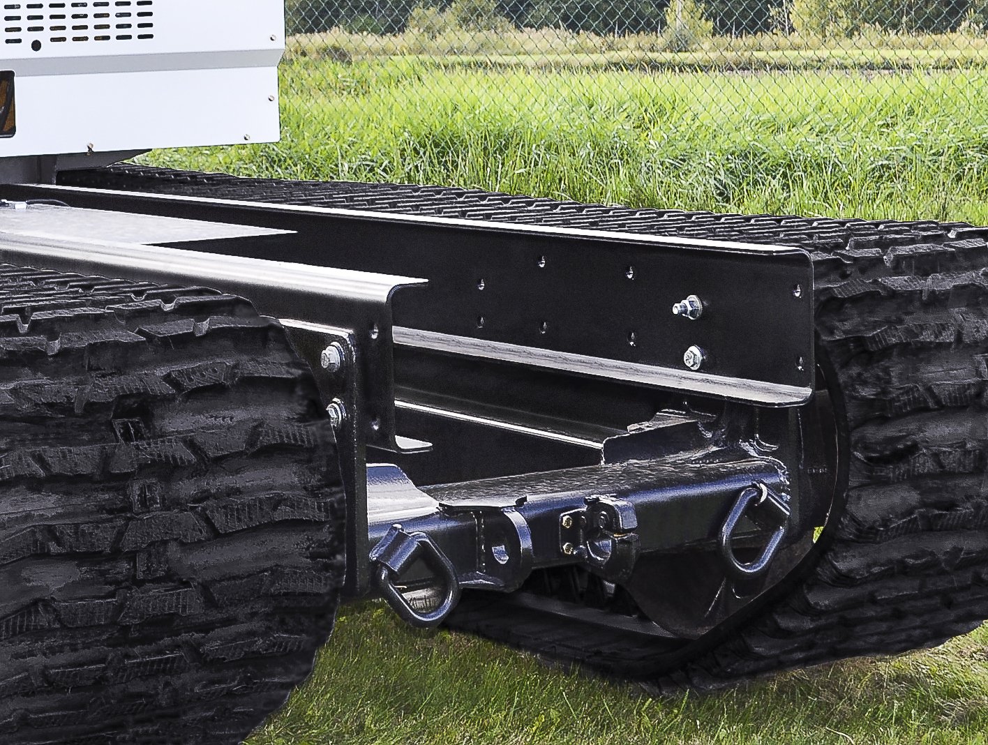 Truck-style chassis for easy implement installations Truck-style chassis for easy implement installations